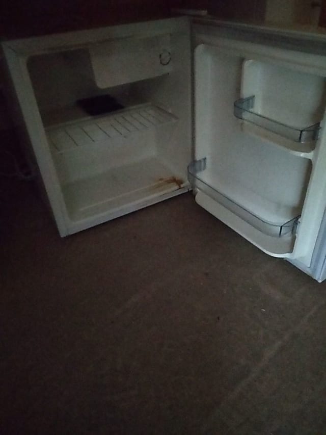 white compact refrigerator