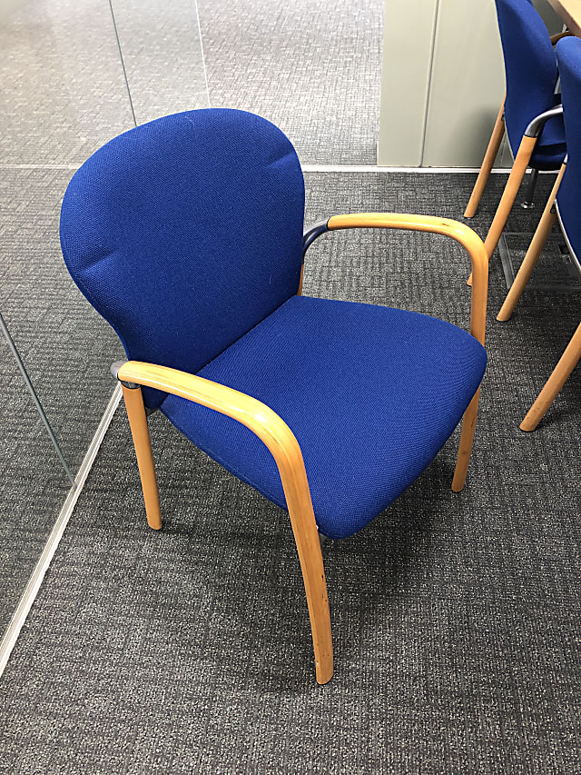 brown and blue rolling armchair