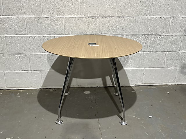 round brown wooden table with aluminium base