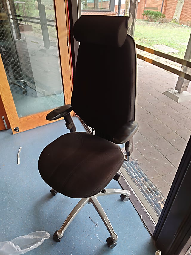 Black operator chair