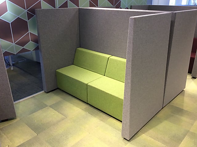 Sofa with wrap around privacy screen