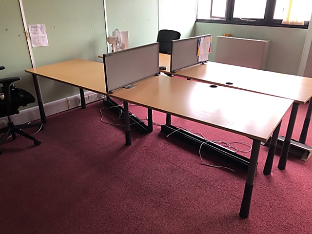 Bank of 2 desks side by side with divider