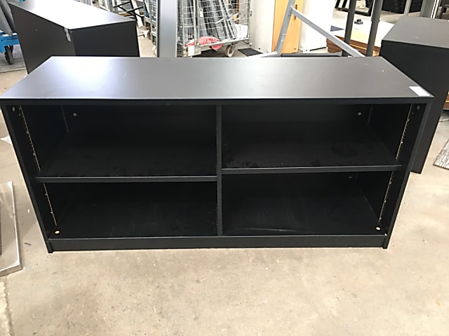 Black wooden cabinet with shelves