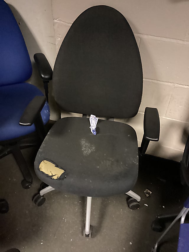 Black damaged operator chair