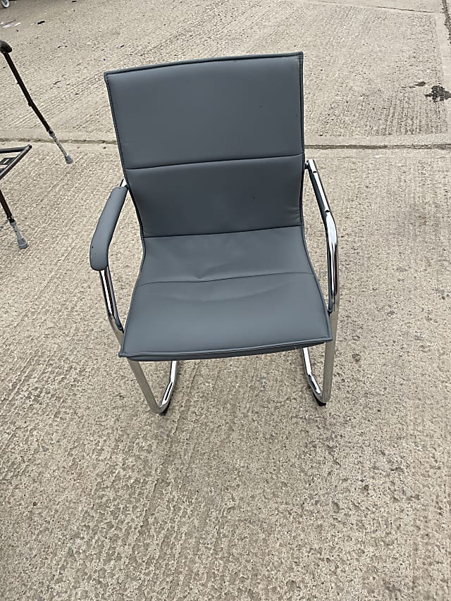 black and gray leather rolling chair