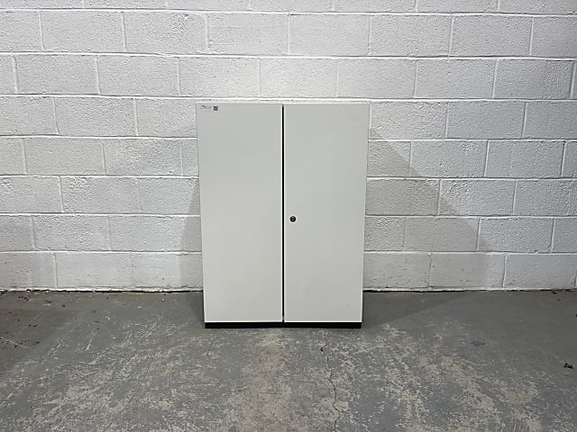 white wooden 2-door cabinet