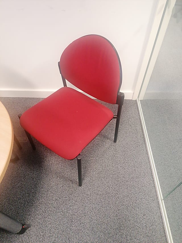 red and black metal chair