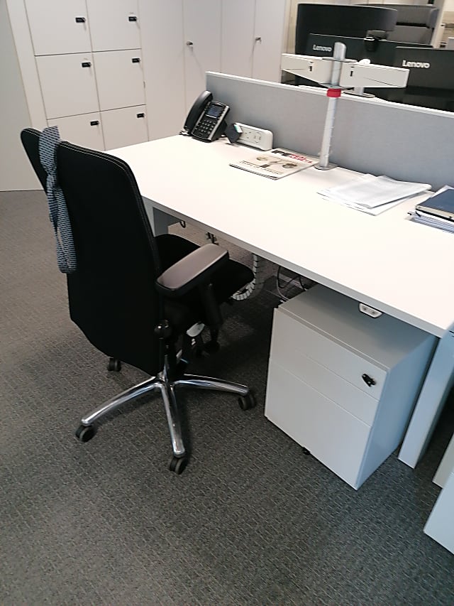 Bank of 4 height adjustable desks