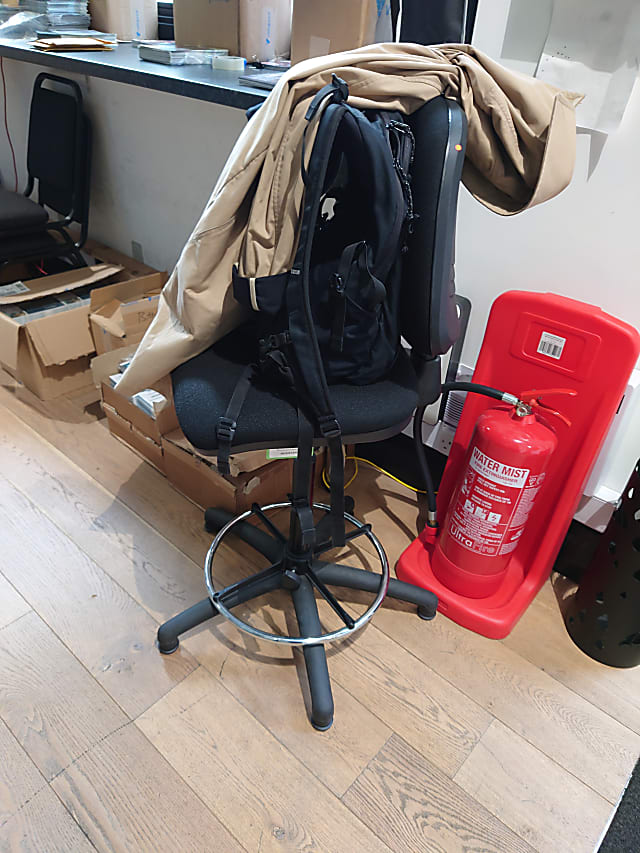 High stand operator chair with foot rests