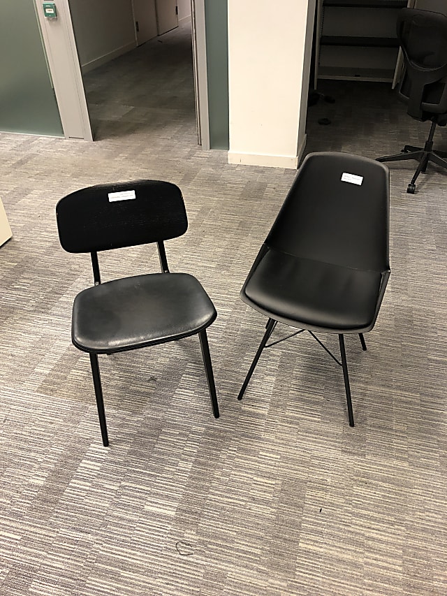 Pair of complimentary black chairs