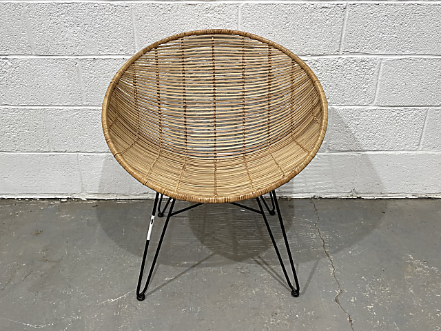 Rattan bucket chair with black steel frame