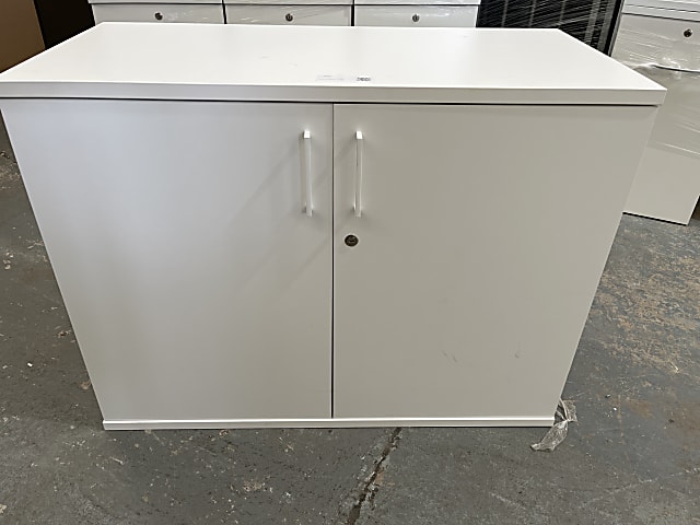 White low cupboard with shelves