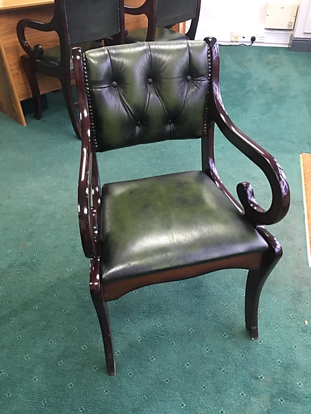 Leather and wood ornate waiting room chair