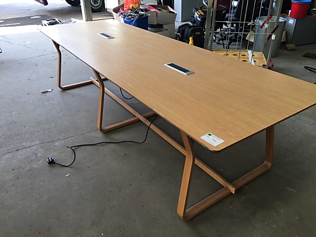 Meeting table with power units