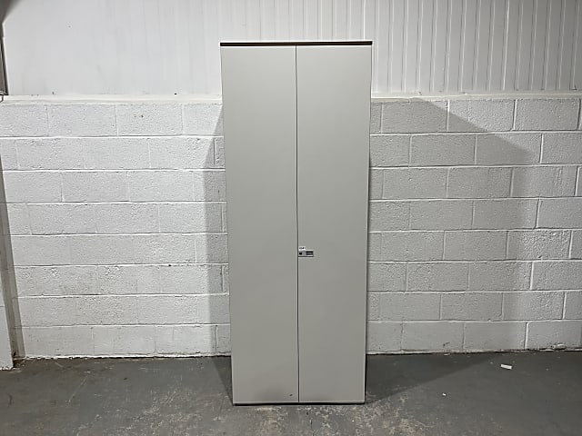 Tall metal storage cabinet with shelves