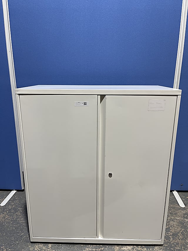 Mid sized white metal storage cabinet with shelves