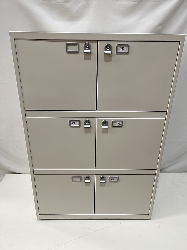 White metal storage lockers with 6 lockers