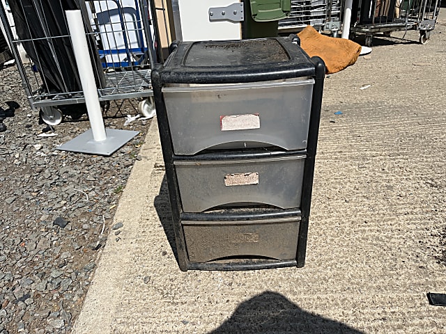 black and gray plastic 4-drawer chest