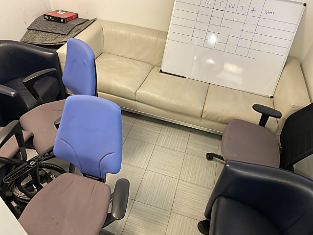 Cream leather three seat sofa