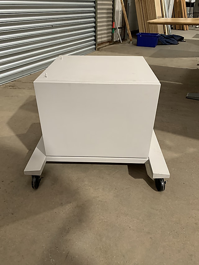 Small metal cabinet on wheels