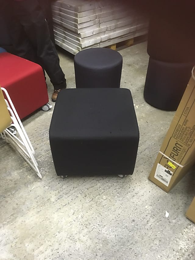 Ottoman padded footstool on wheels