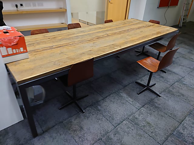 Large solid welded frame meeting table