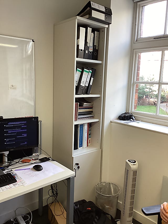 white thin wooden shelf cabinet