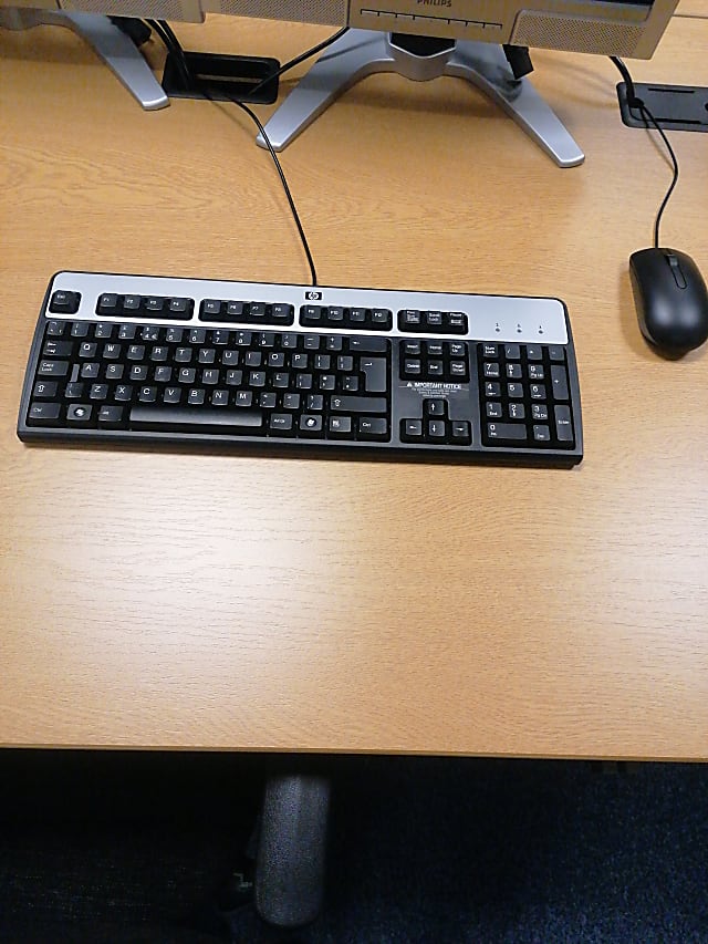 black and gray computer keyboard and mouse