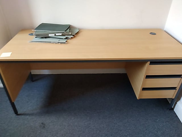 brown wooden single-pedestal desk