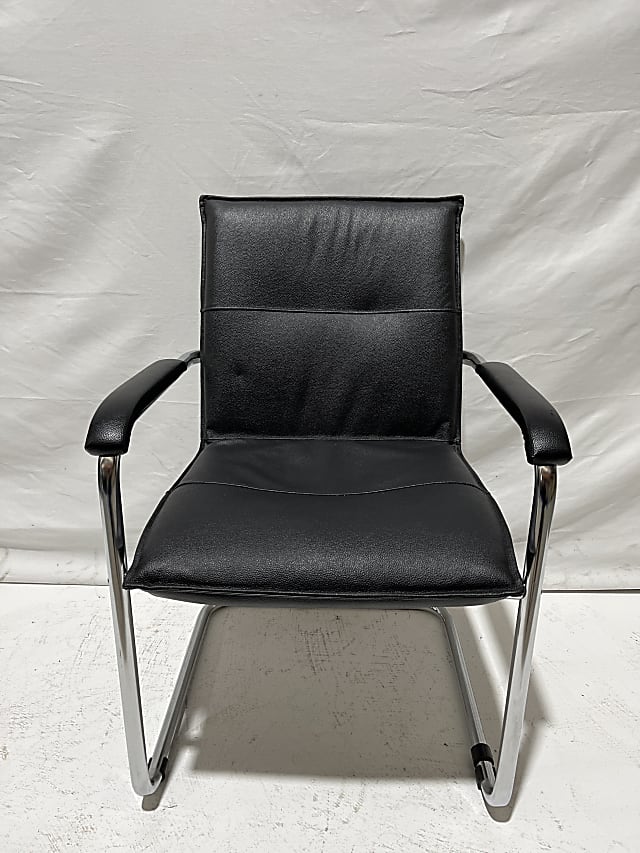 Black faux leather visitor chair chrome frame