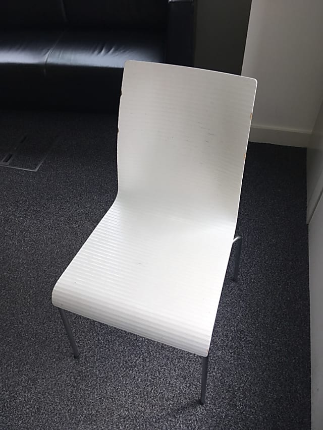 white armless chair