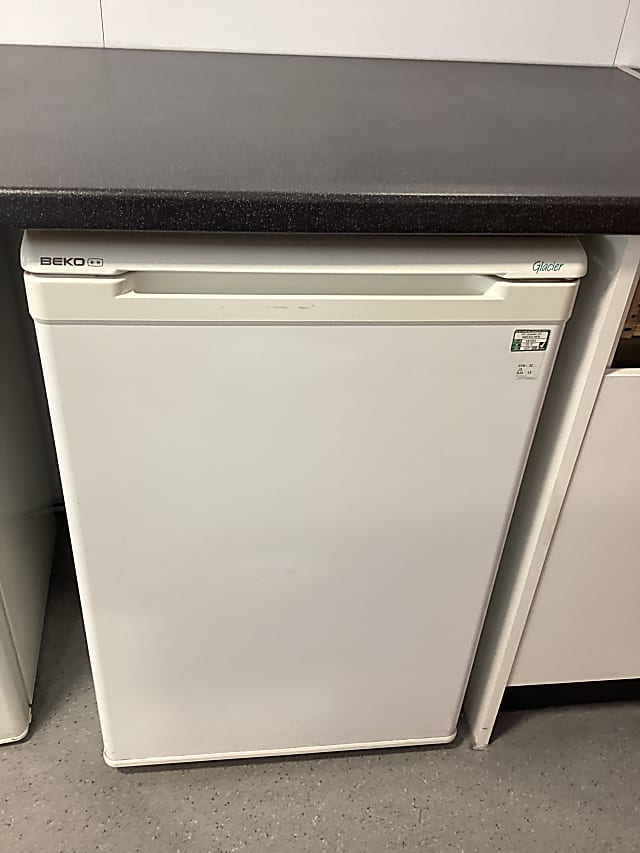 white Beko top-mount fridge