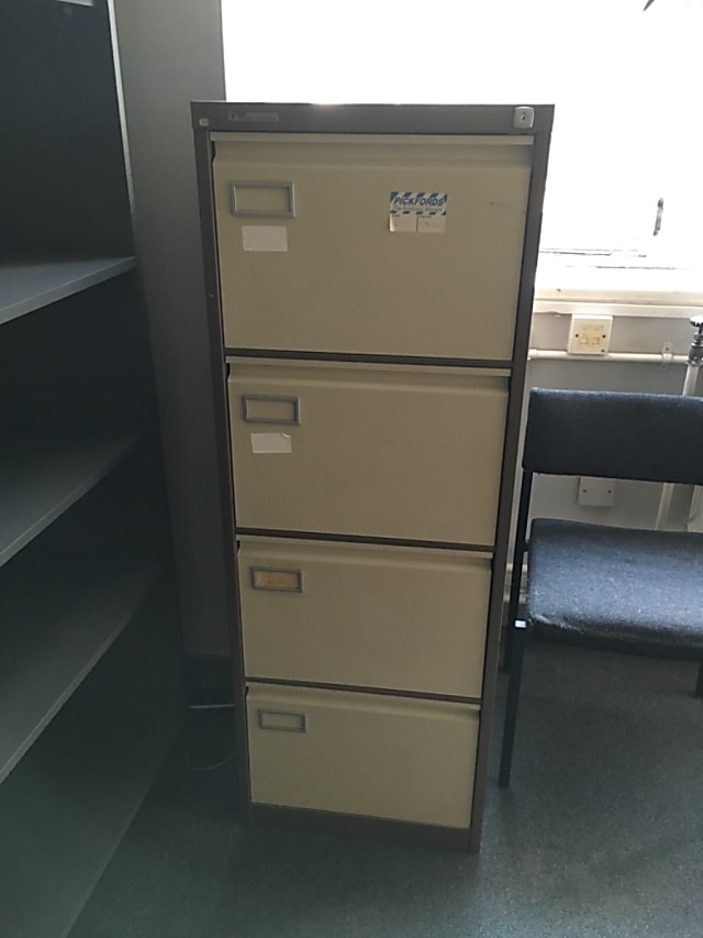 Four drawer metal filing cabinet