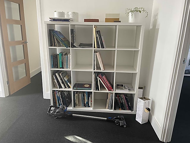 white wooden 6-cube shelf/bookcase