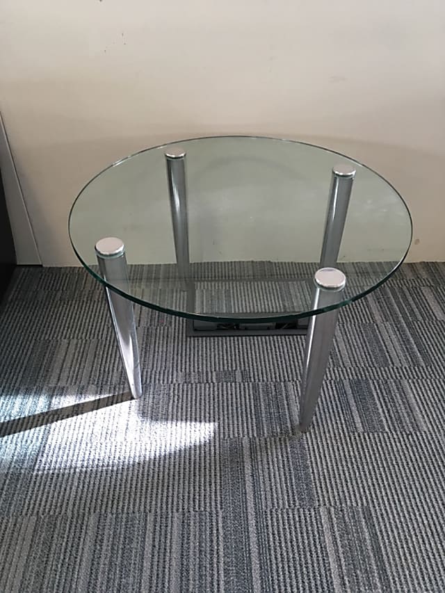 Allermuir round glass coffee table