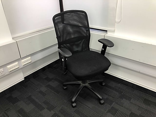 Black mesh back operator chair