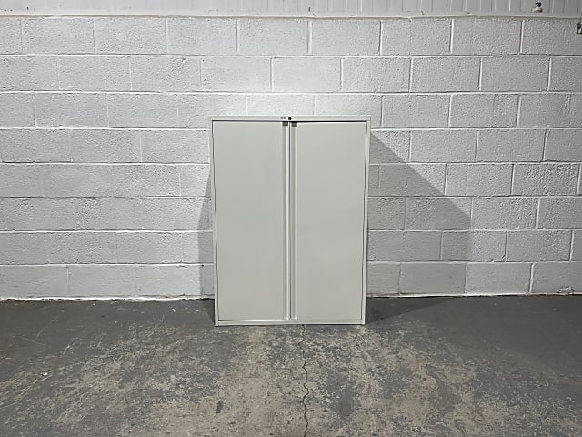 White Metal storage cabinet with shelves