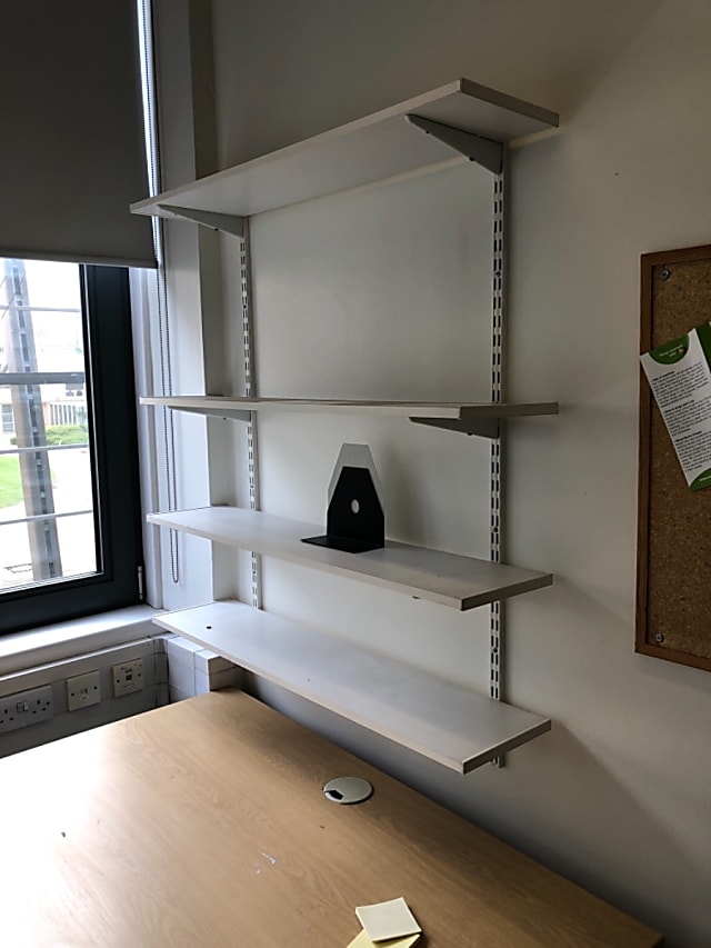 Wall shelves with brackets