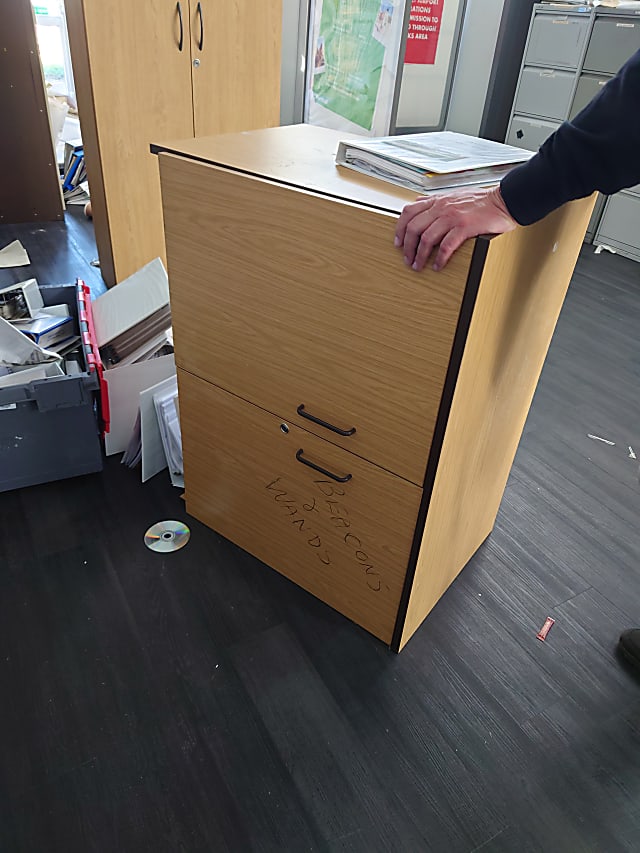 Damaged wooden cabinet