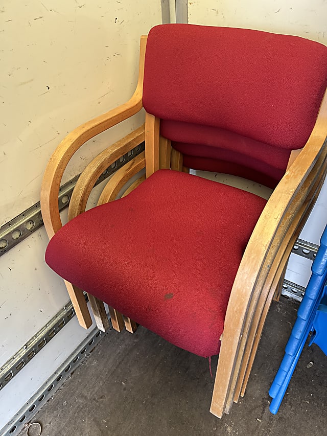 brown wooden framed red padded chair