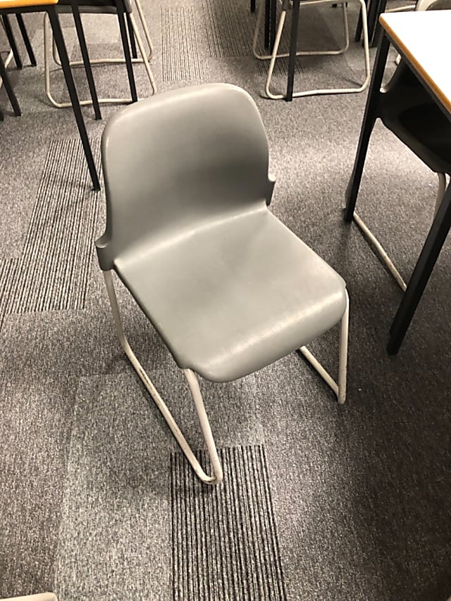 Grey plastic waiting room chair