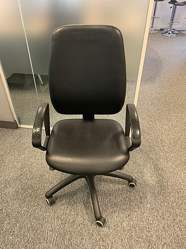 Black leather effect operator chair