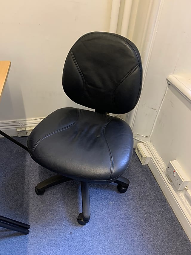 Leatherette office chair on wheels