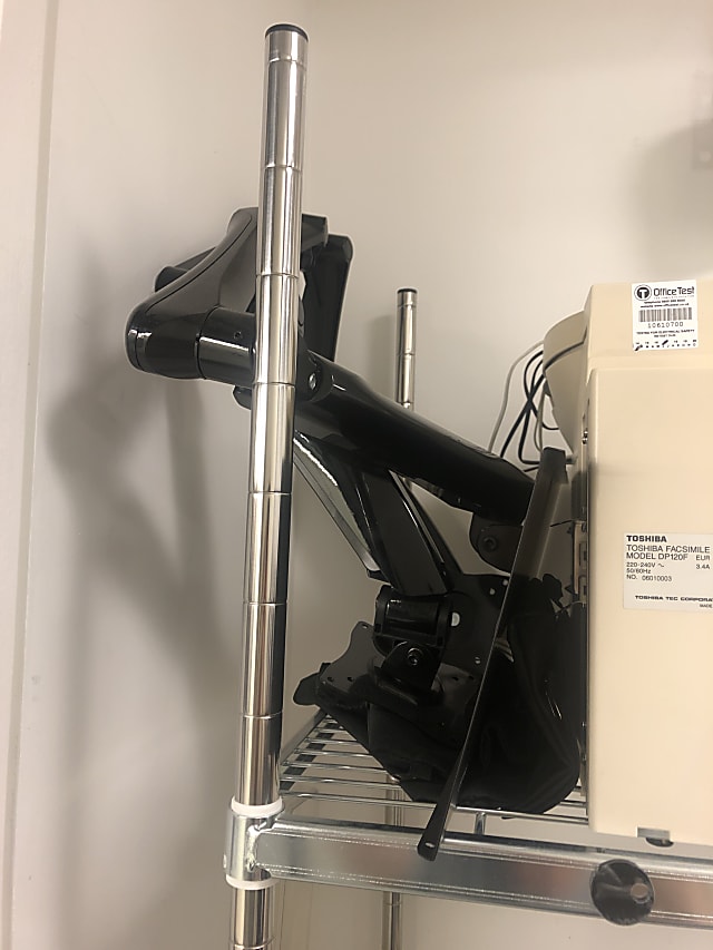 Some sort of articulated monitor arm on 10th floor