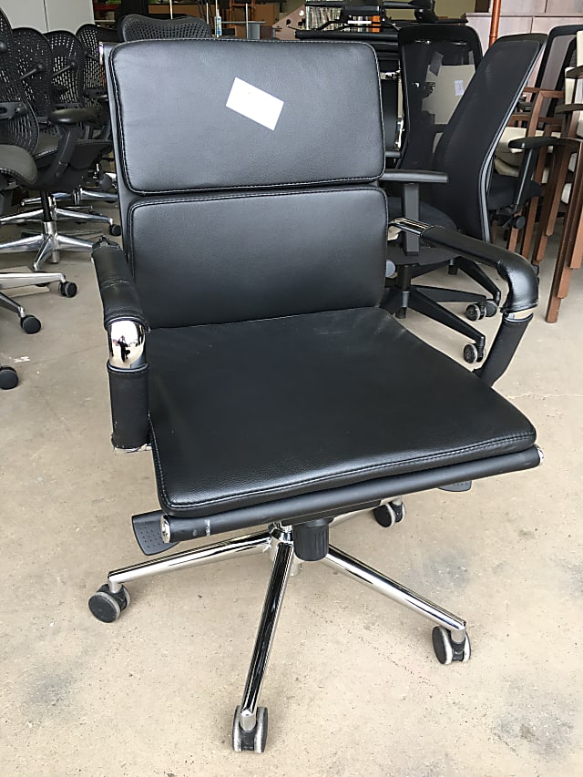 Leather office chair on wheels with chrome arms and frame