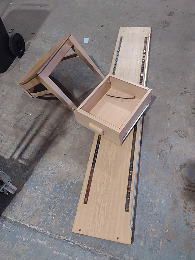 brown wooden framed glass top table