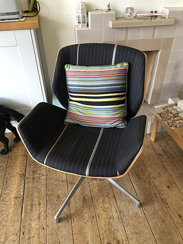 black and white striped padded chair