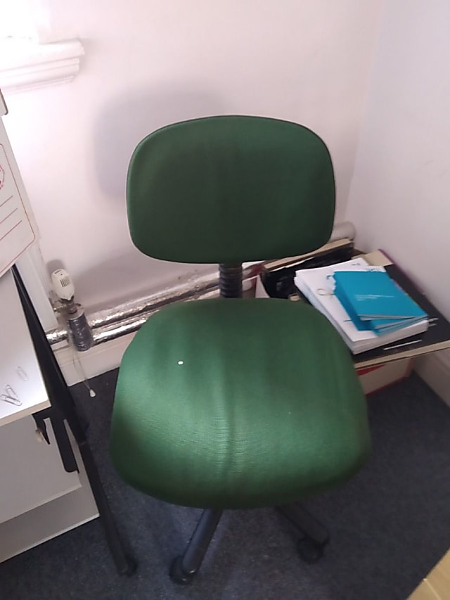 green fabric padded steno chair