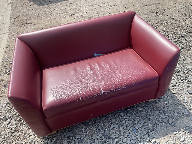 Leather padded sofa chair