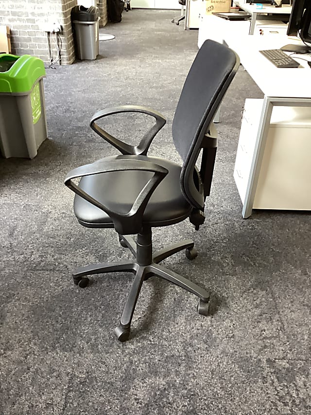 Black mesh back operator chair